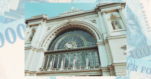 Close-up of a vintage-style railway clock at Budapest Keleti station, representing a life-changing journey and 1,000 forints story.