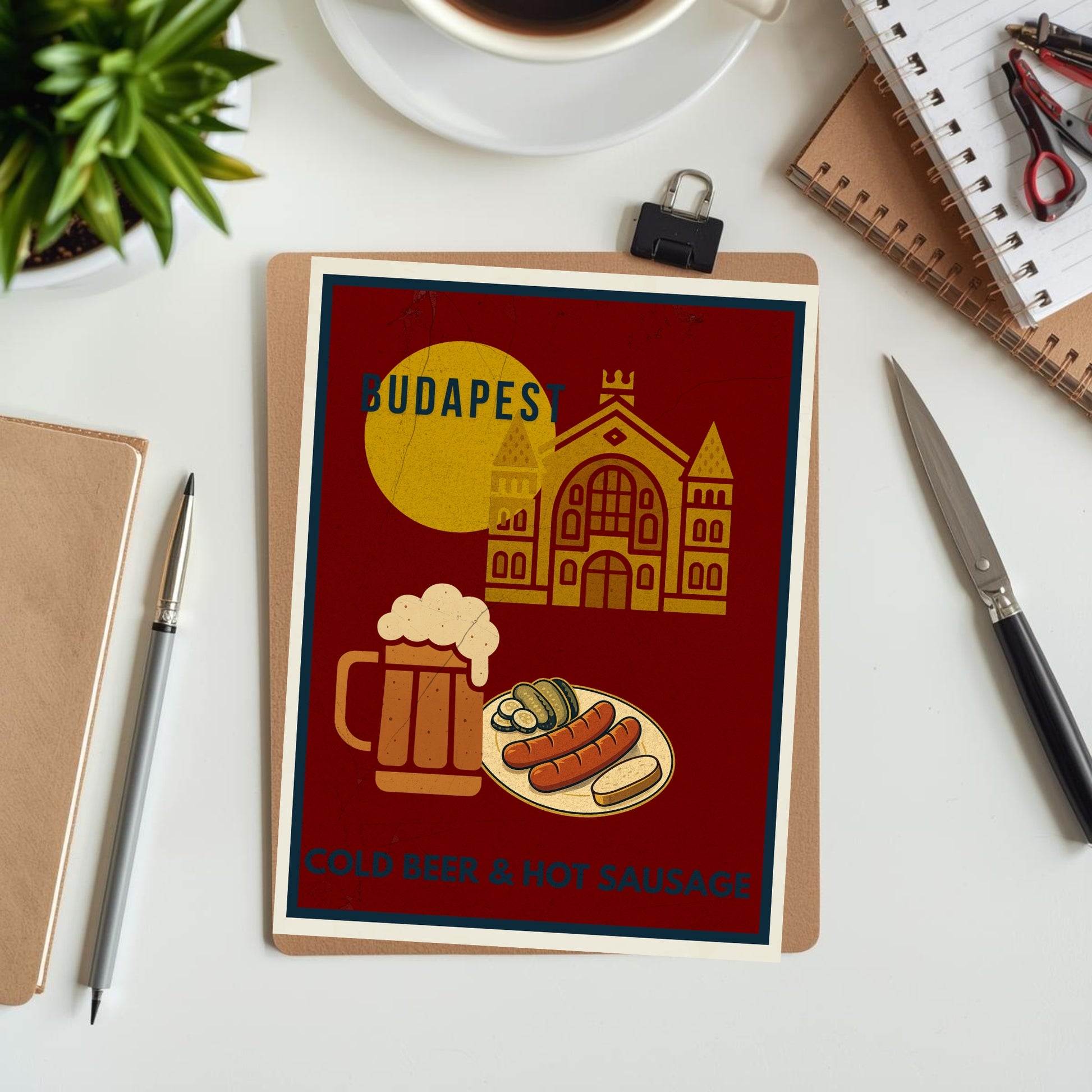 Budapest Urban Gastro poster flatlay on a creative desk, suggesting preparation and design work.