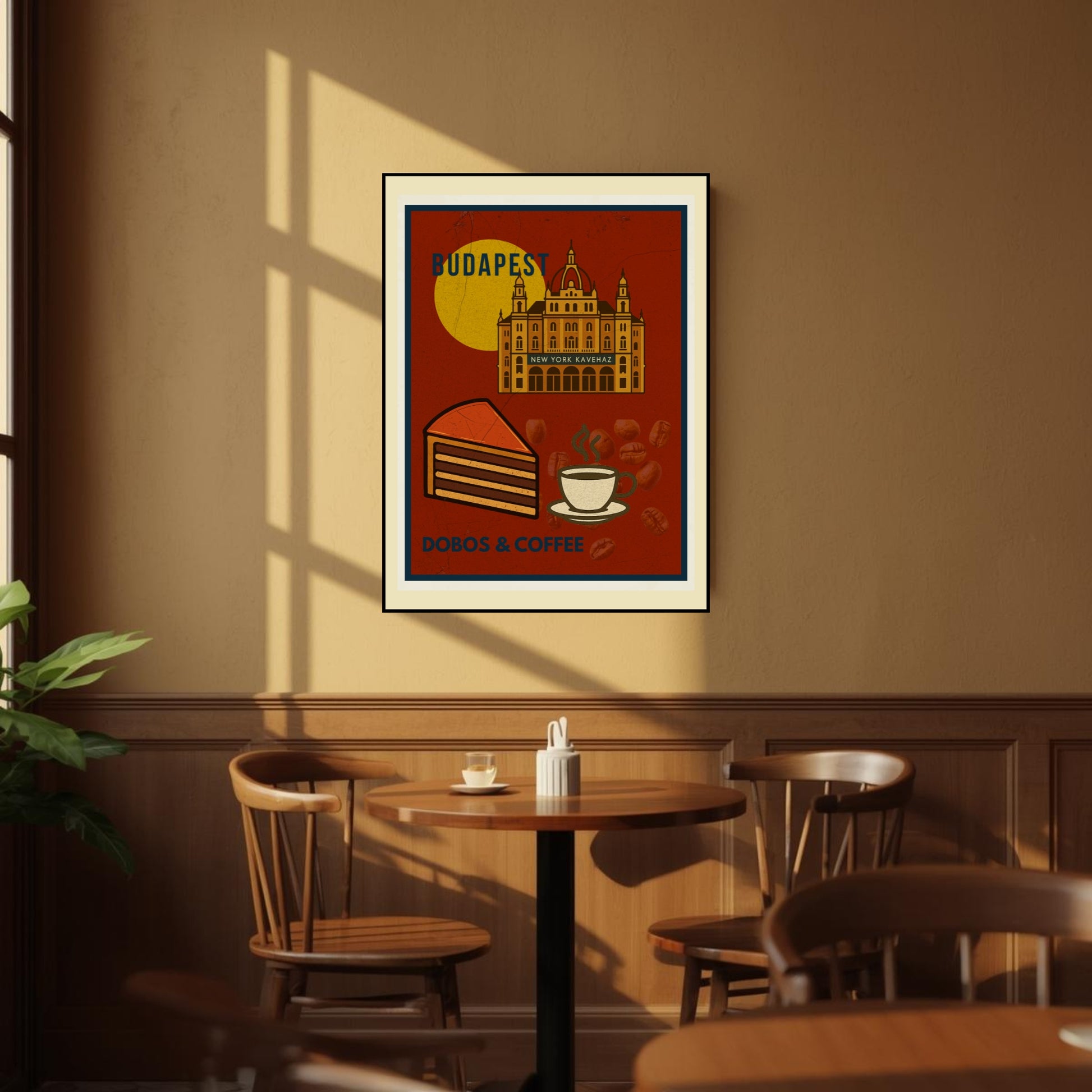 Budapest “Dobos & Coffee” art print hanging in a cozy café interior, styled with warm natural light and classic bistro furniture inspired by Budapest coffeehouse culture.