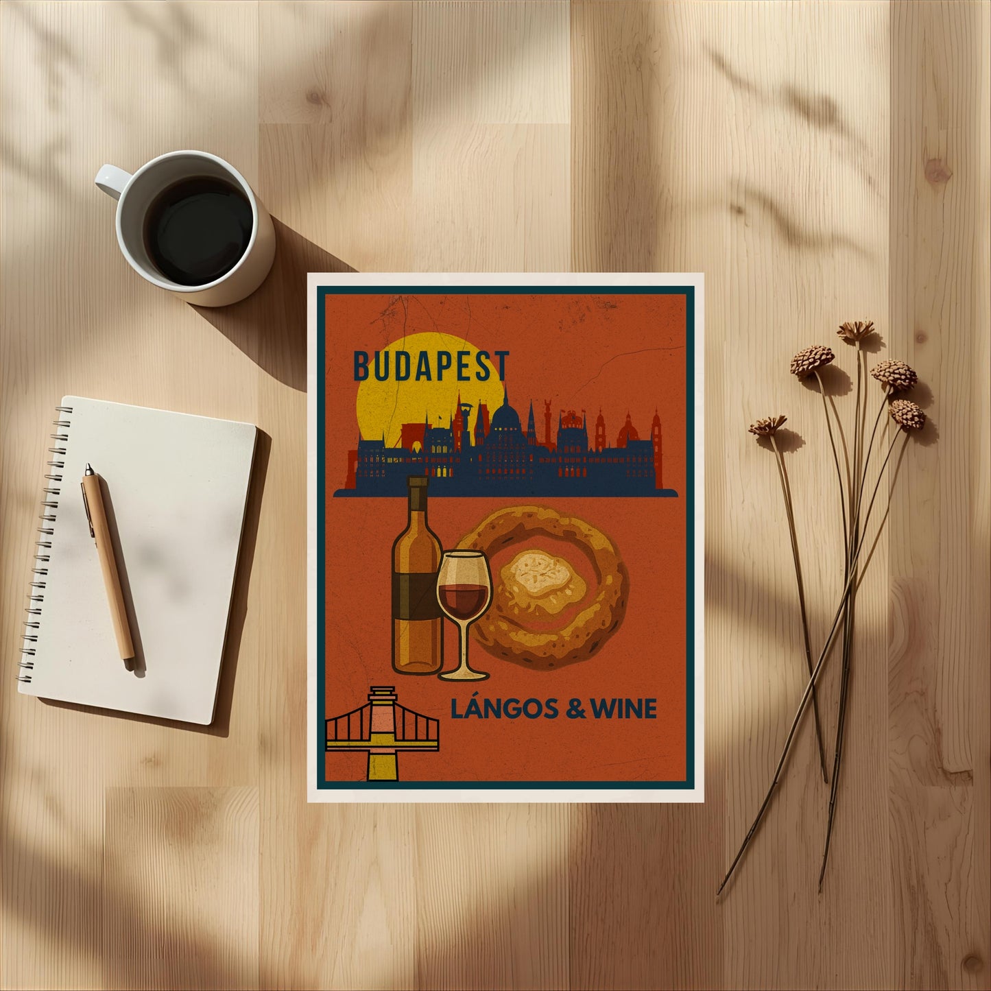 Budapest Lángos & Wine brown digital poster shown as a flatlay on a wooden table with coffee and notebook, highlighting the print design